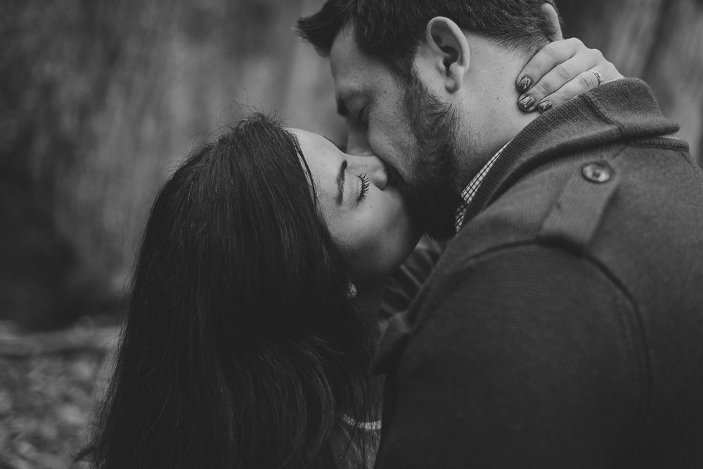 Black and white of couple kissing