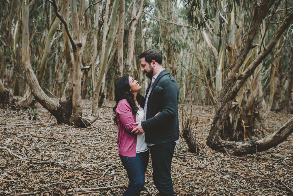 Couple in eucalyptus trees