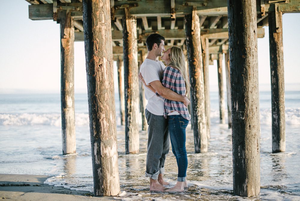 Engagement photos at Shell Beach Under Pier