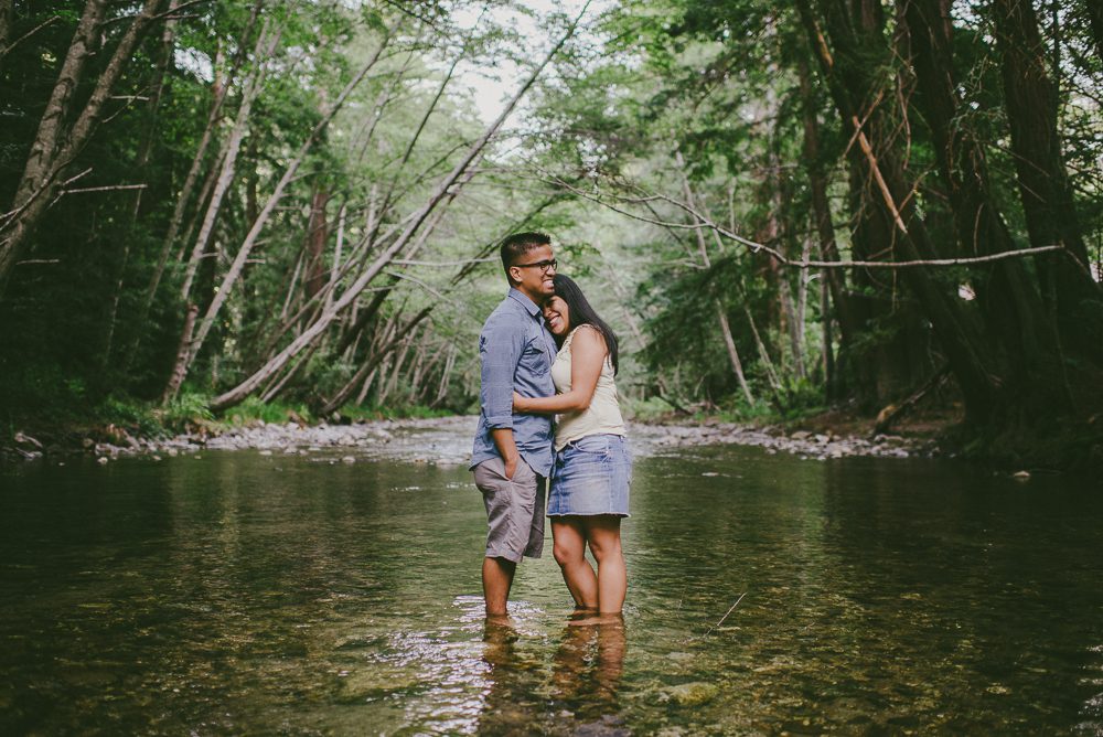 pfeiffer state park engagement photo in river