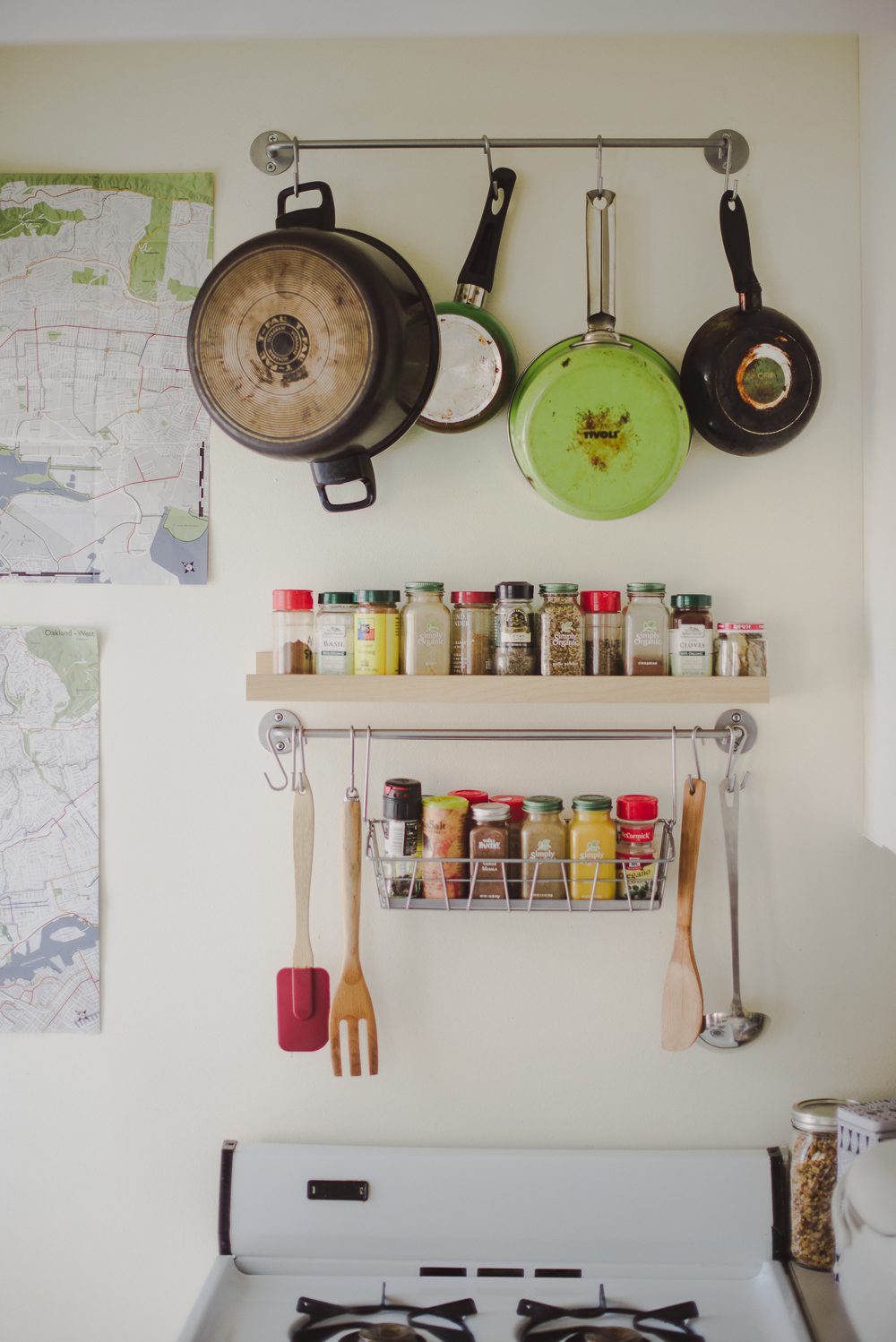 spices and pans hanging in kitchen