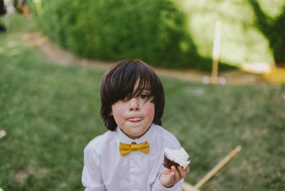 little boy with cupcake