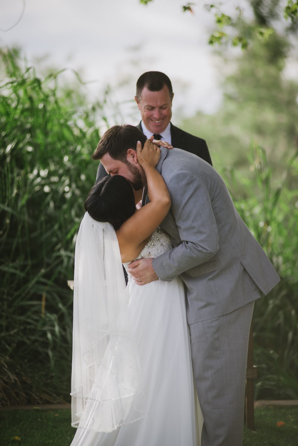 bride and groom first kiss at Wedding Party at San Joaquin River Parkway Wedding