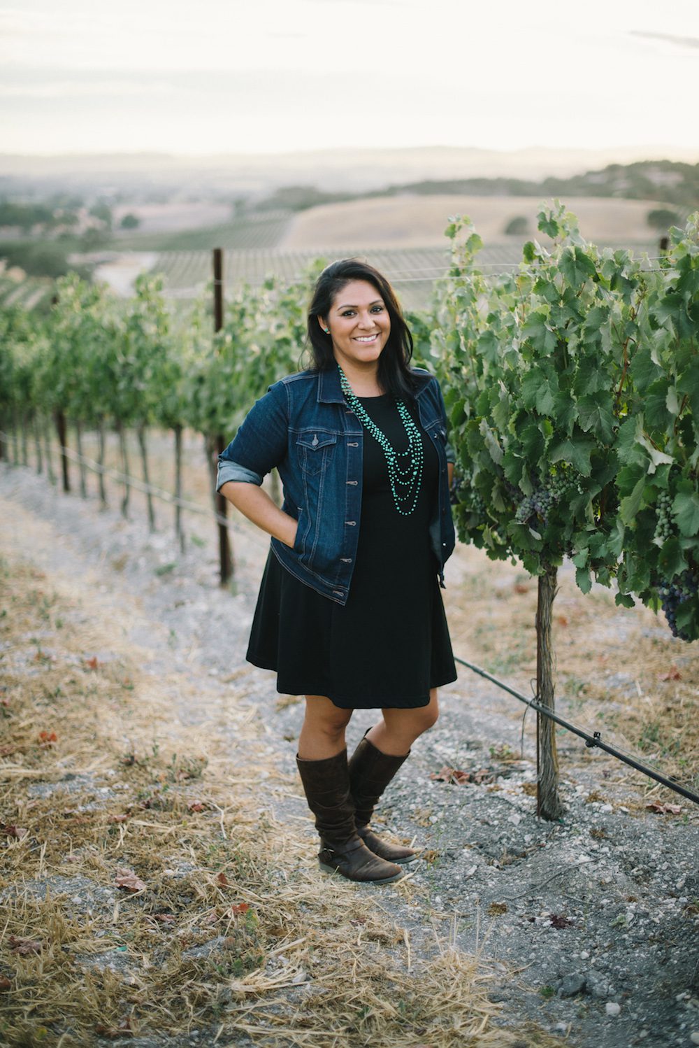 woman posing in vineyard in templeton california