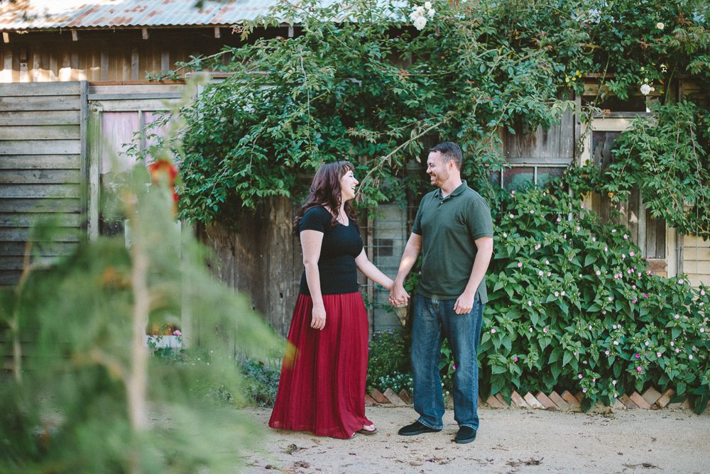Engagement photography in Cambria California couple in garden