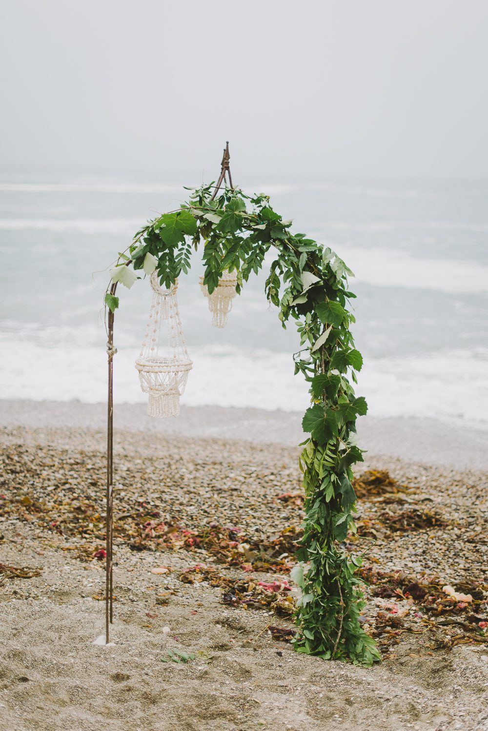 Decorated arch on the beach for montana de oro wedding