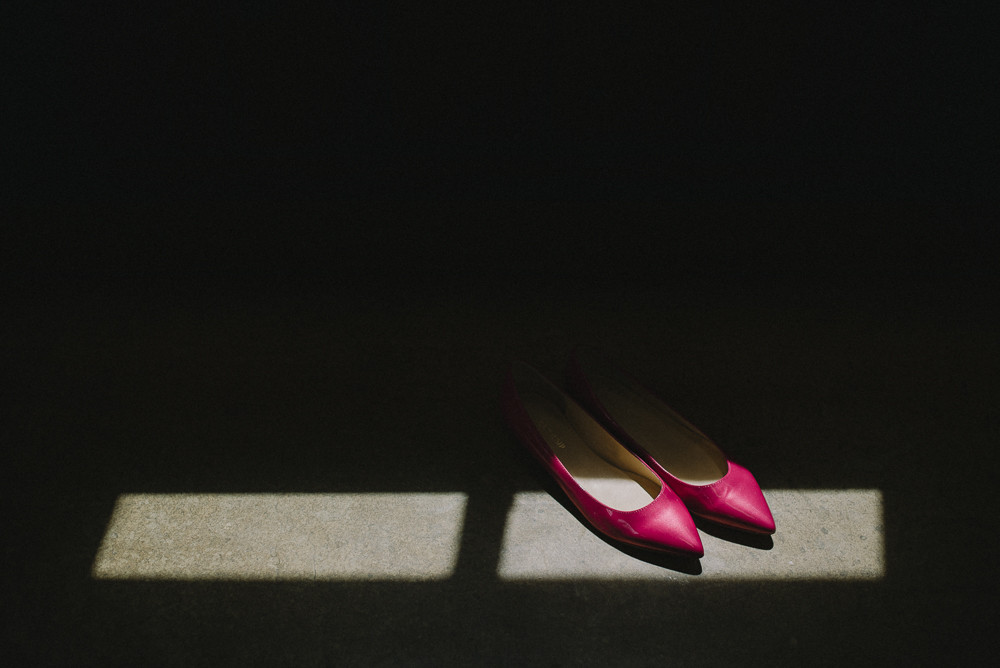 wedding shoes in dramatic light