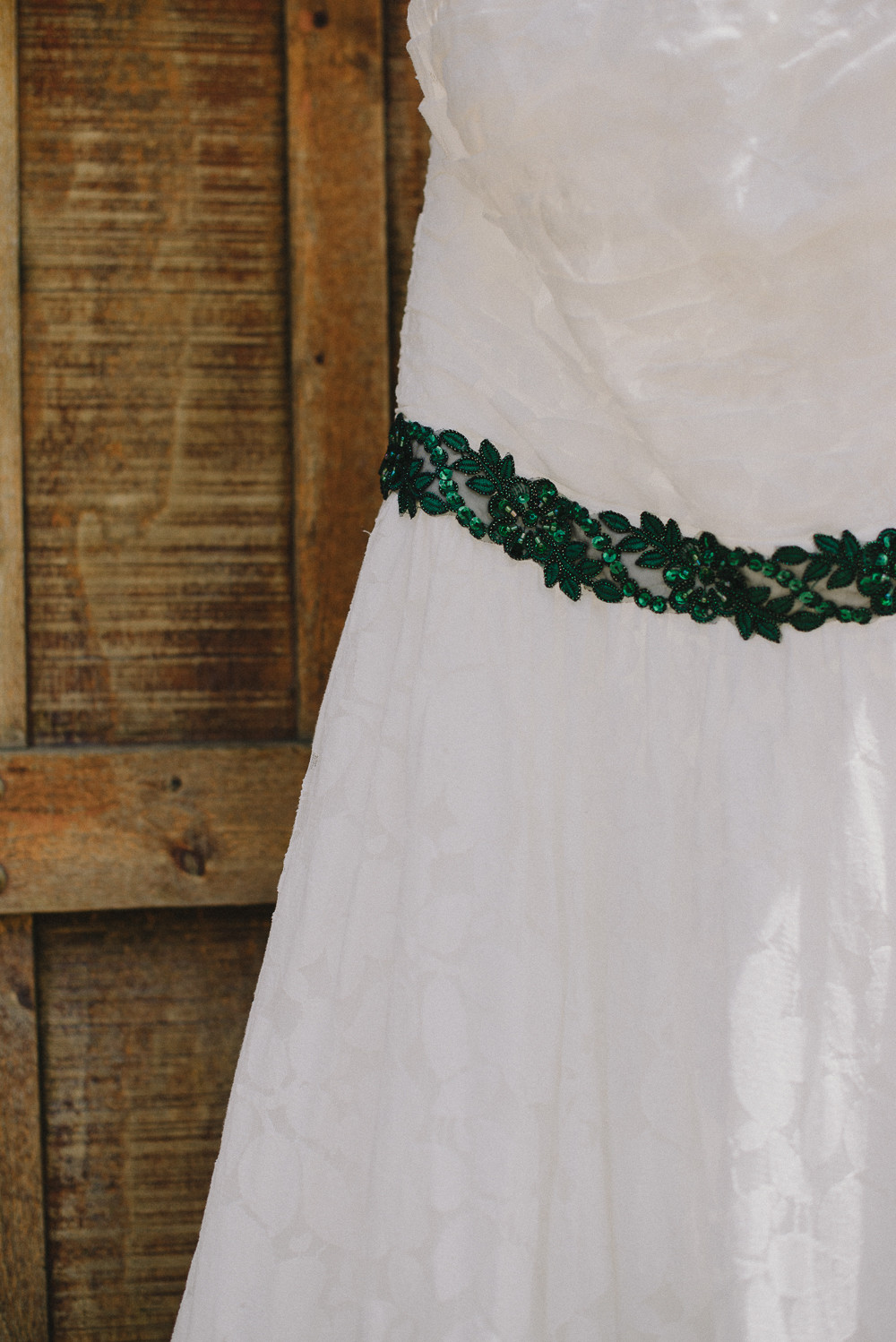 lace wedding dress with green belt