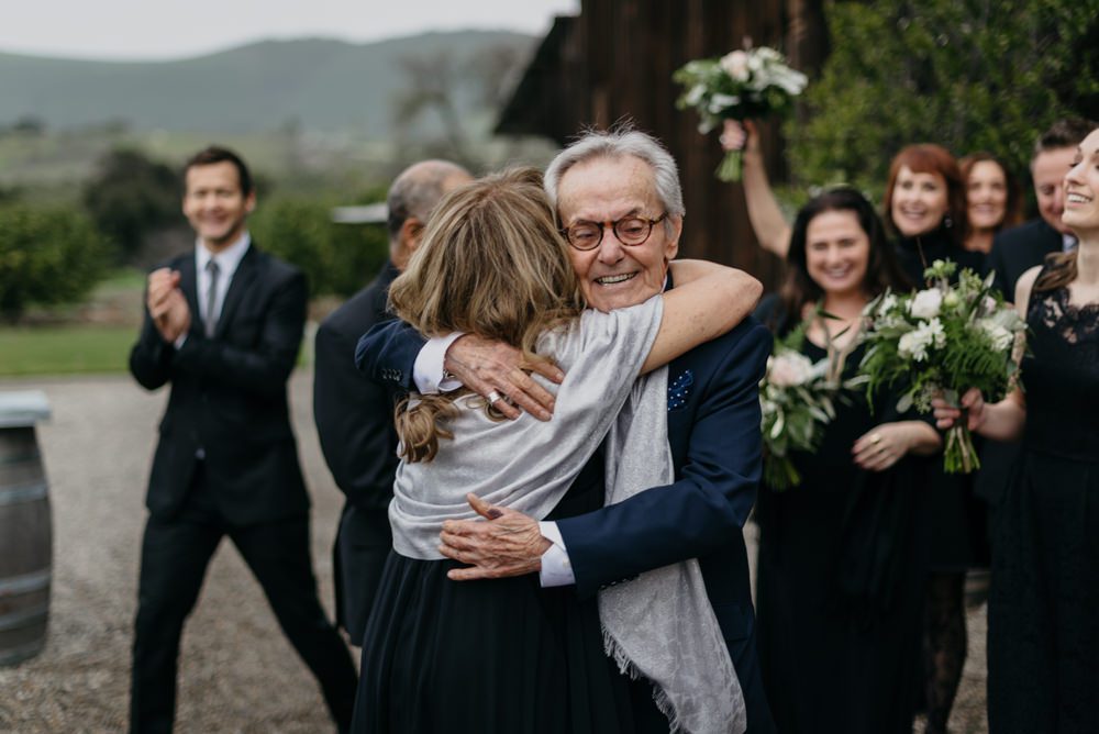Hugging after California Barn Wedding