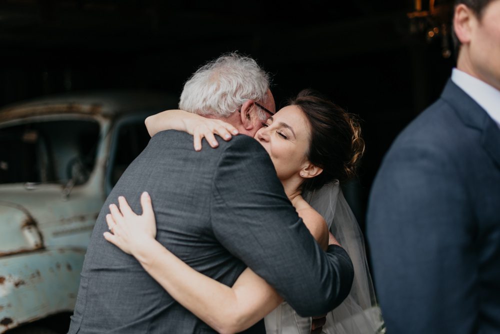 Hugging after California Barn Wedding