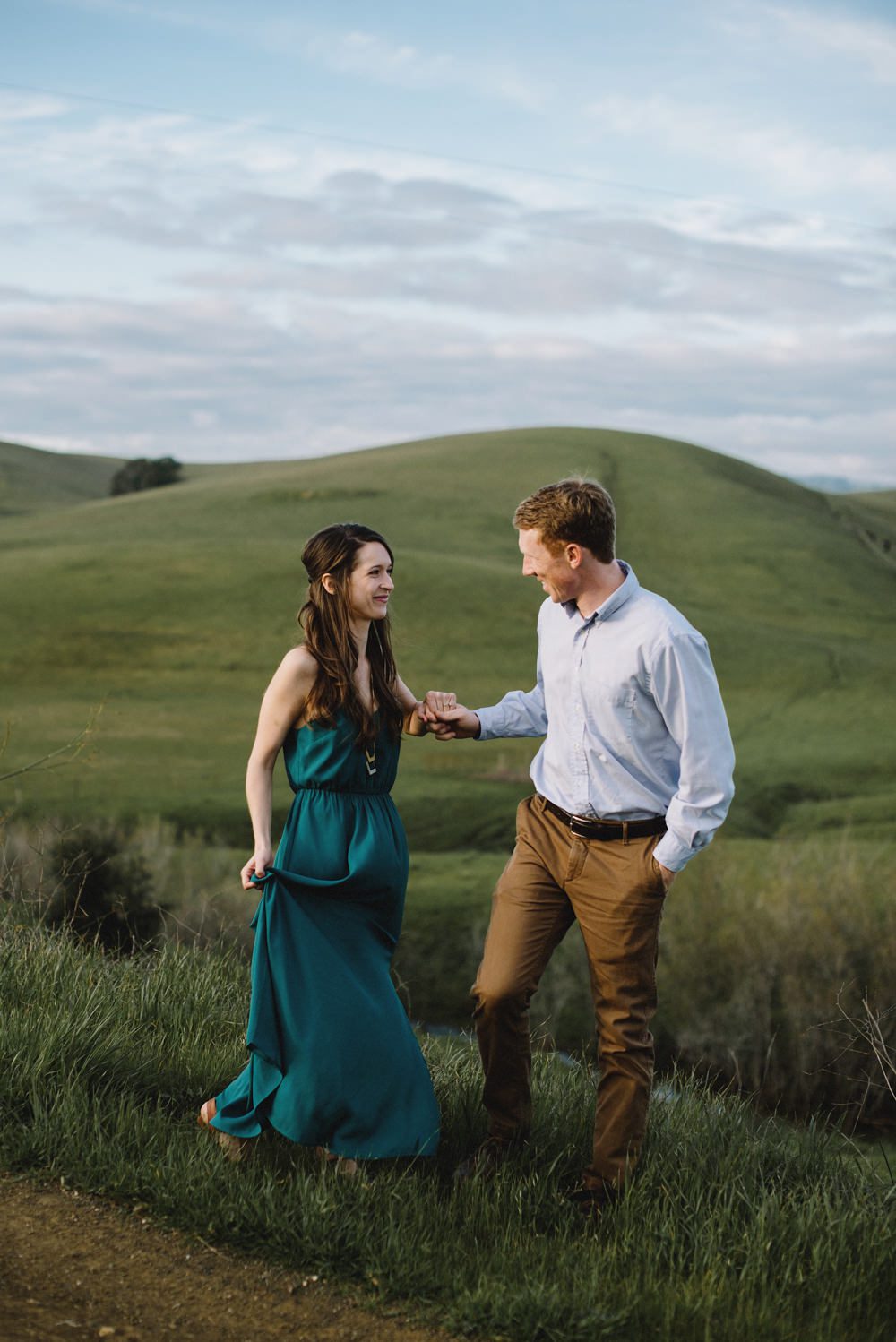 Green rolling hills engagement photo