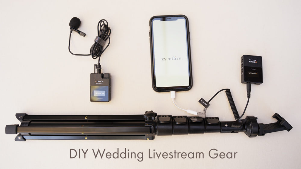 top down look at equipment to DIY livestream. Phone with eventlive logo, phone tripod stand, audio gear with mic and receiver.