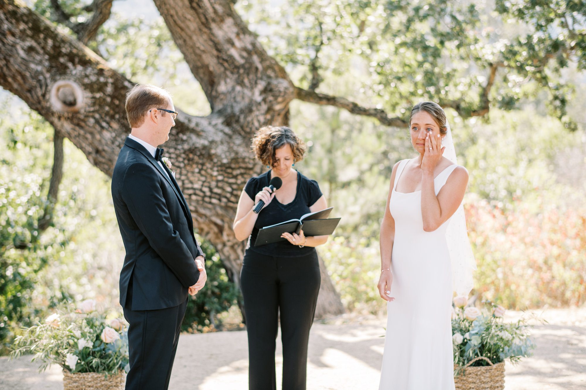 Bride crying during wedding ceremony captured by San Luis Obispo Wedding Photographer, Tina Loveridge